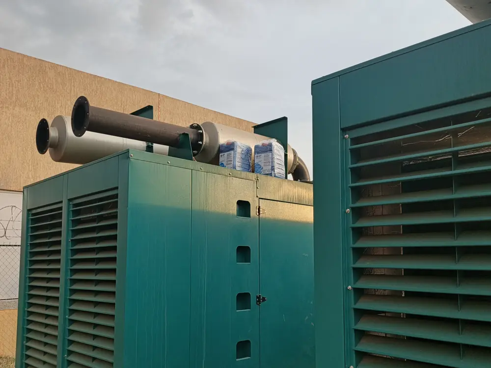 A canopy-enclosed standby generator